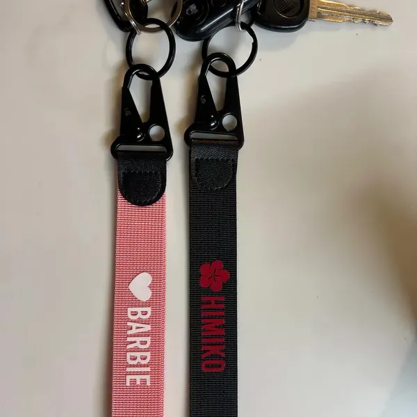 black with red letters and pink with white letters