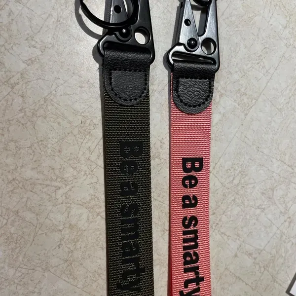 military green with black letters and pink with black letters