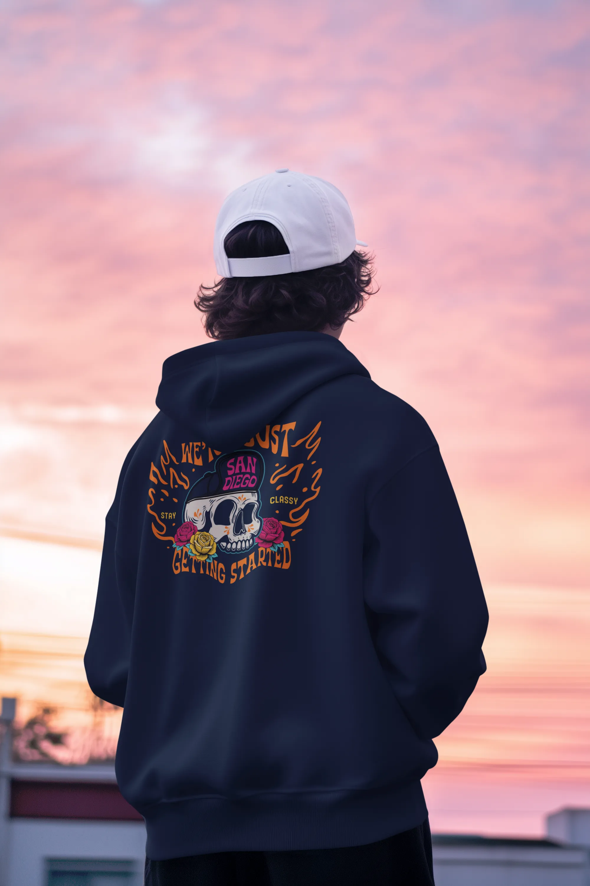 Back view of a navy hoodie with a full-color printed San Diego skull design