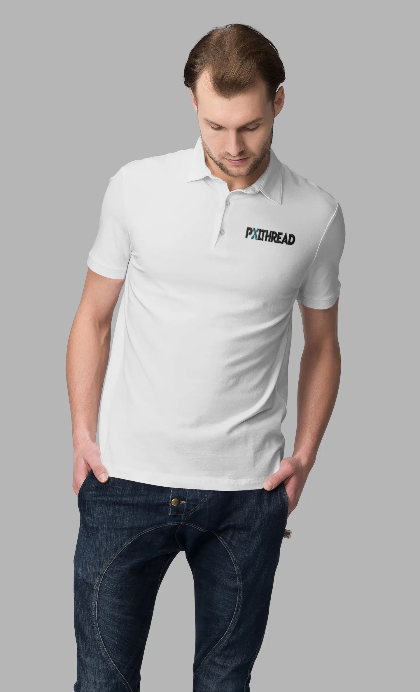 Man wearing a white polo with an embroidered company logo on the chest