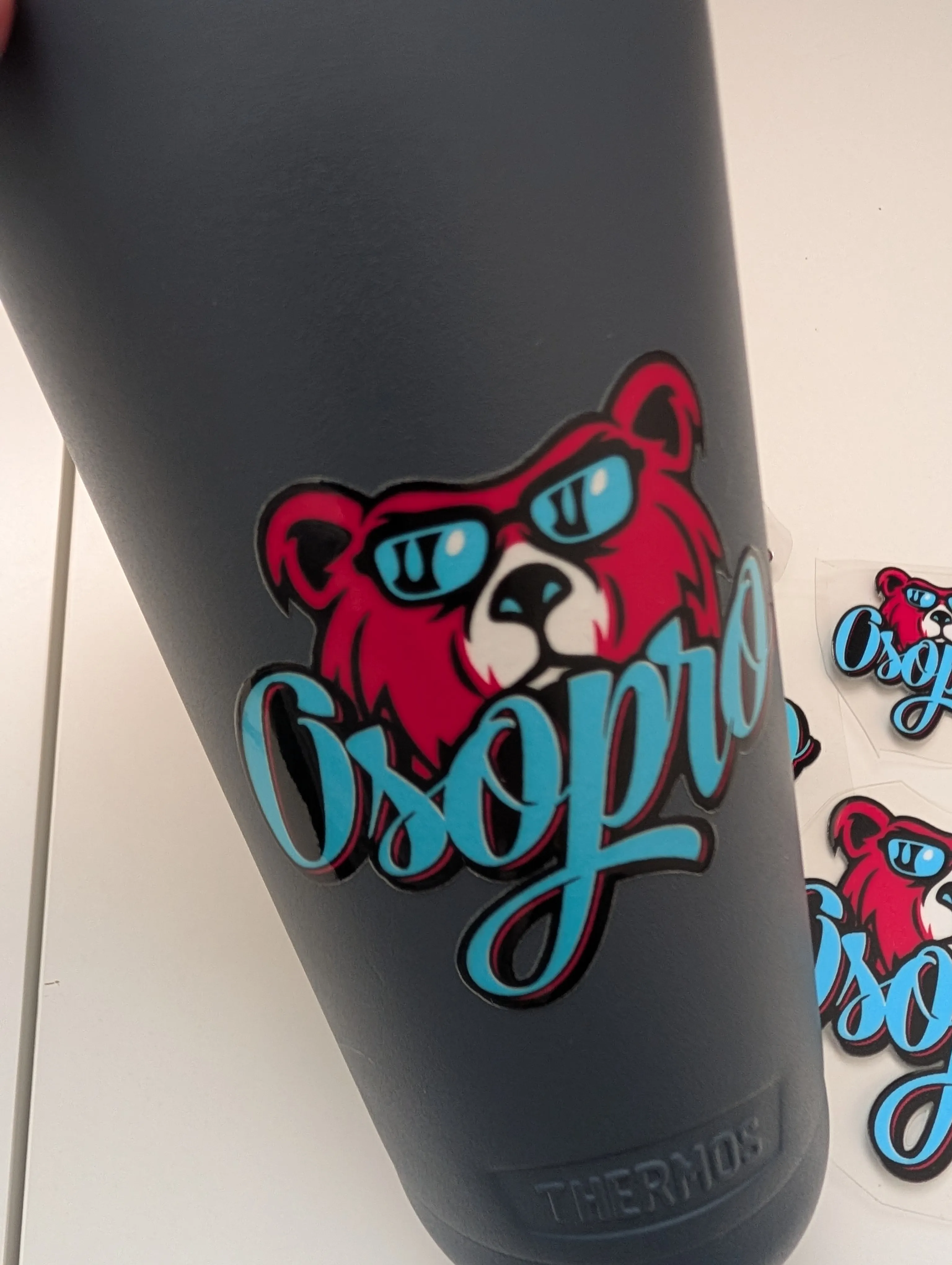 OsoPro UV DTF sticker applied to a thermos water bottle